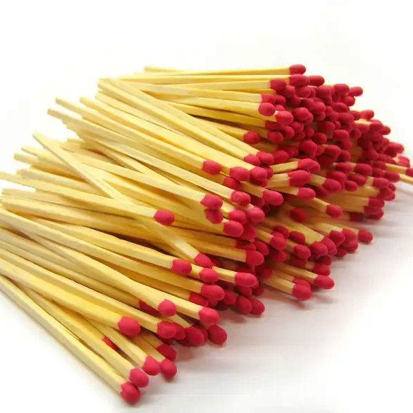 Premium Long Stick Safety Matches Suppliers in India Pile of long wooden safety matches with red tips, supplied by trusted Indian manufacturers